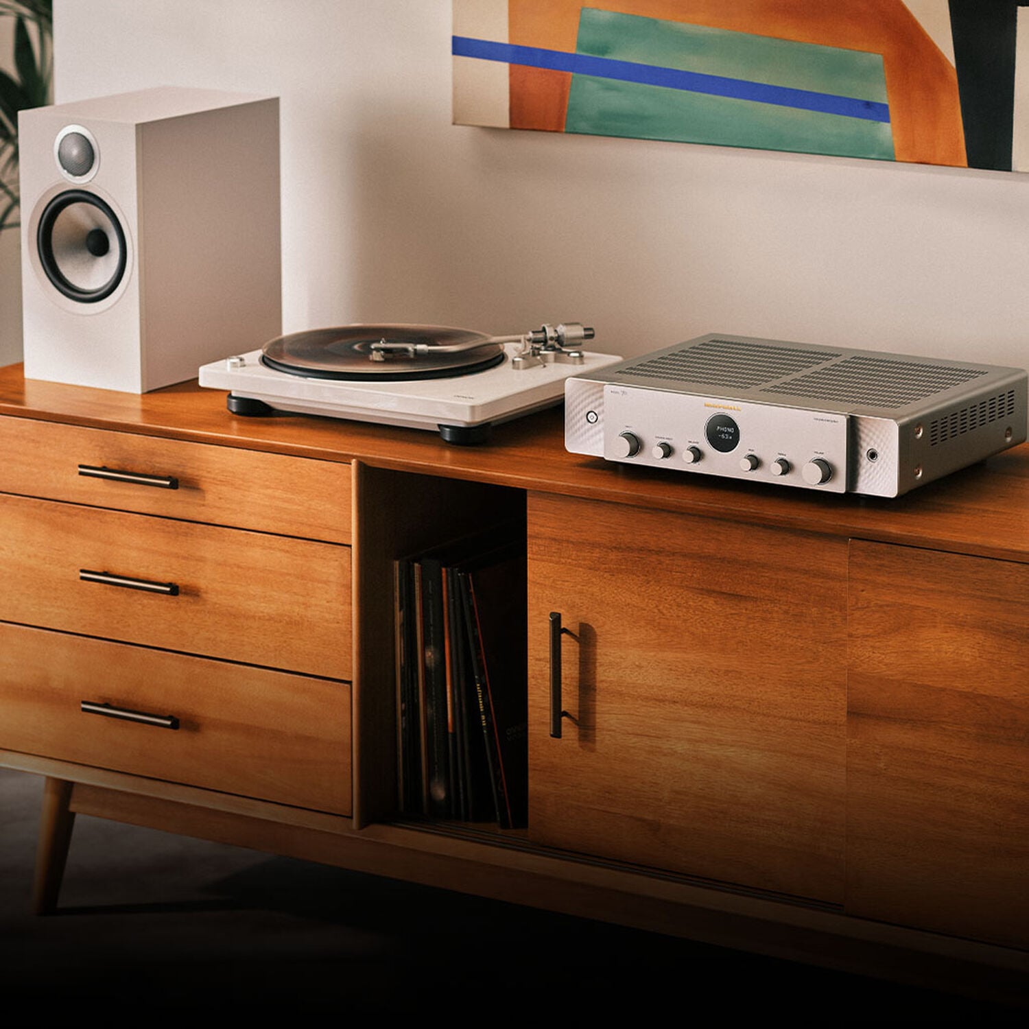 Silver-Gold Model 70 lifestyle image facing left sitting on wooden console