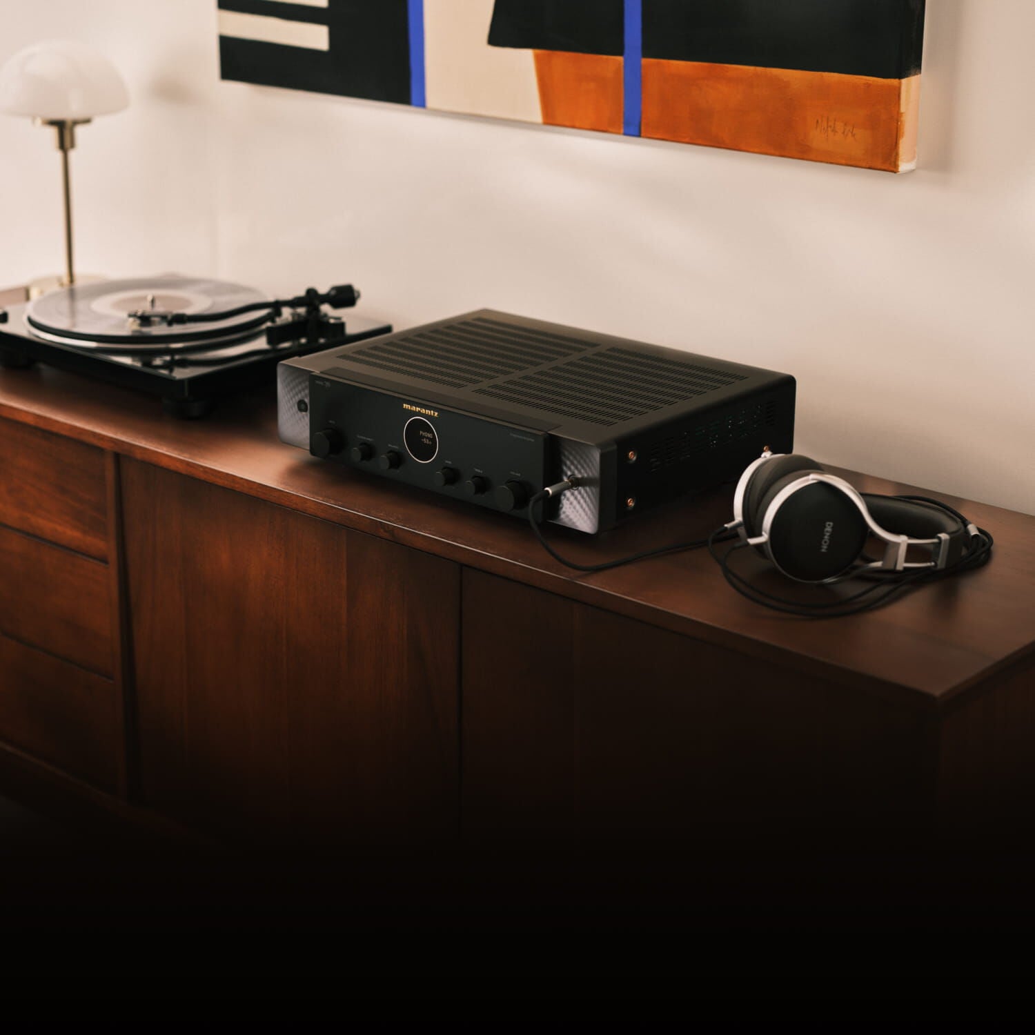 Black Model 70 lifestyle image facing left sitting on wooden console