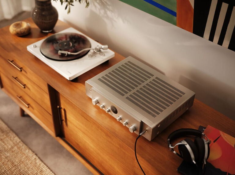 Silver-gold Model 70 on wooden console