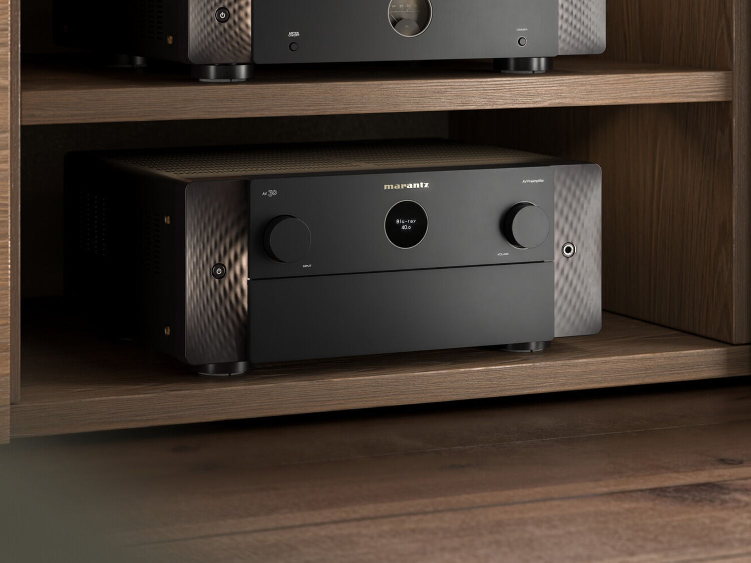 Black AV30 sitting inside dark wood media console