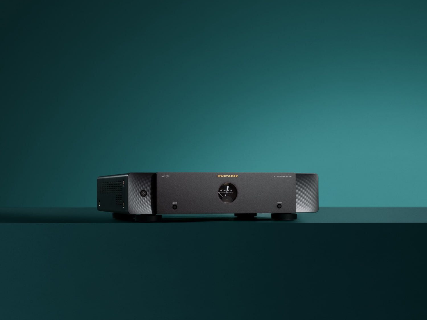 Black AMP 30 with teal background