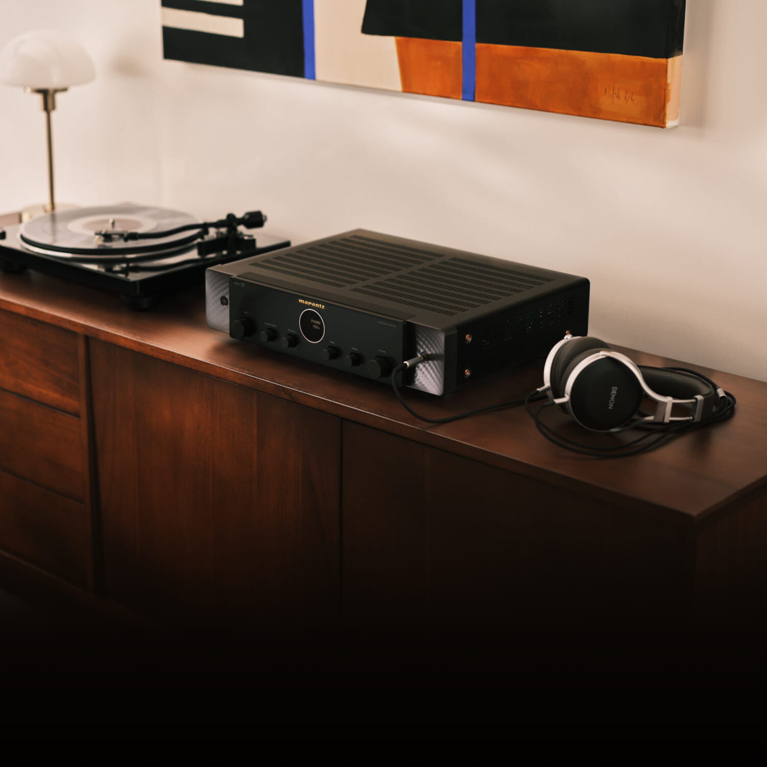 Black Model 70 lifestyle image facing left sitting on wooden console