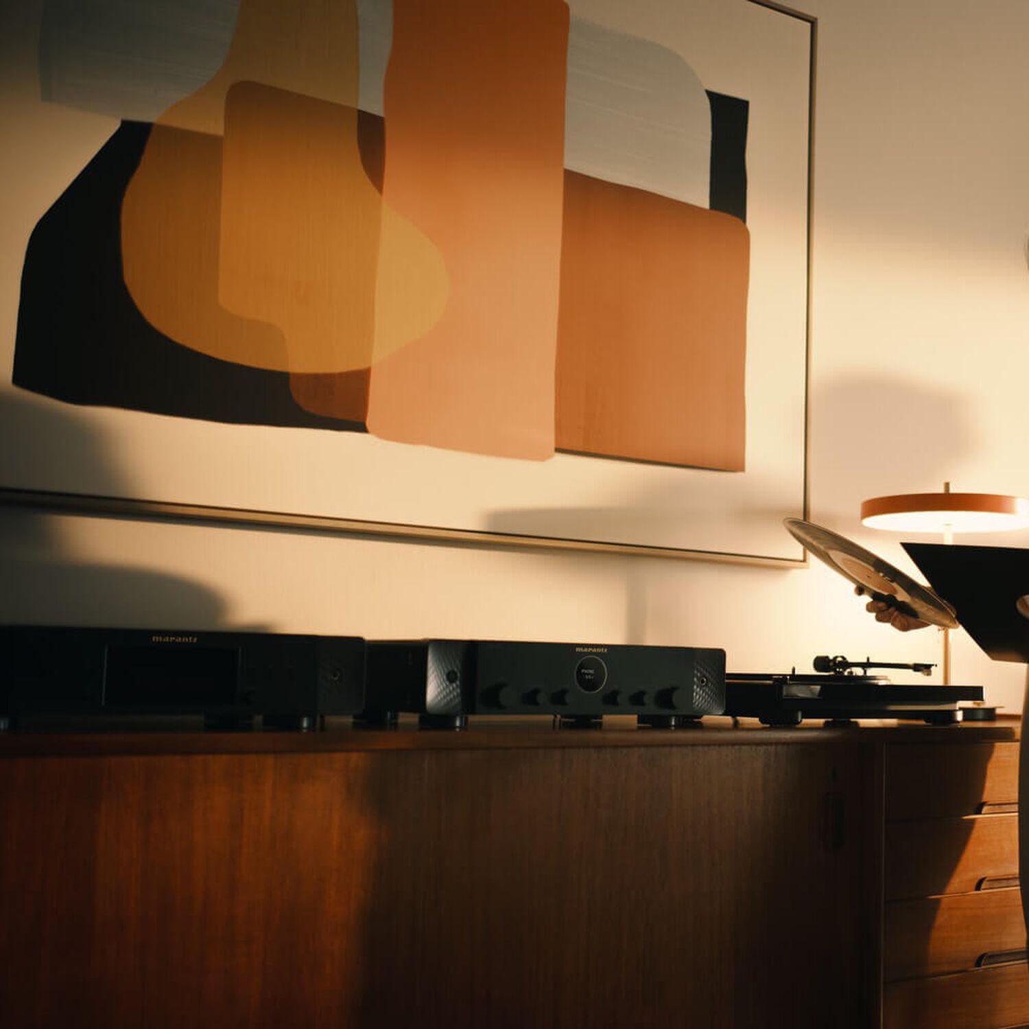 Black Model 70 lifestyle image facing left sitting on wooden console